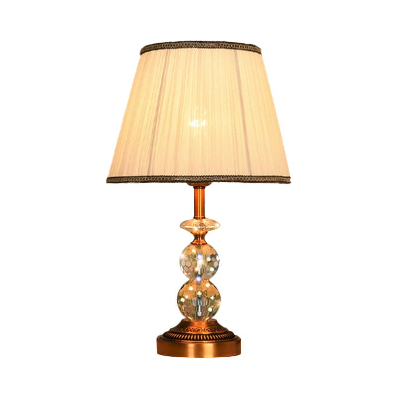 Lampe de table élégante forme conique cristaux taillés