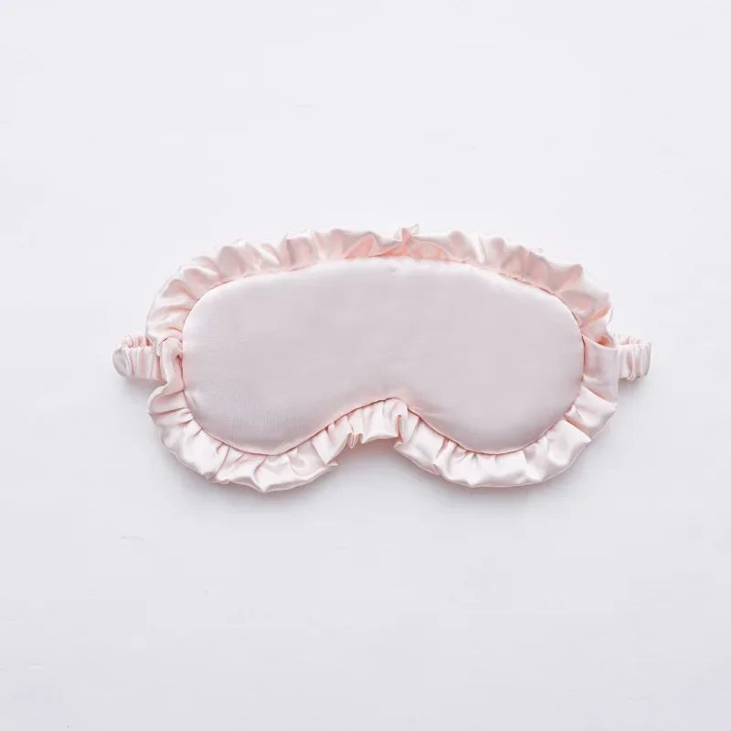 Masque de sommeil en soie à volants élégants
